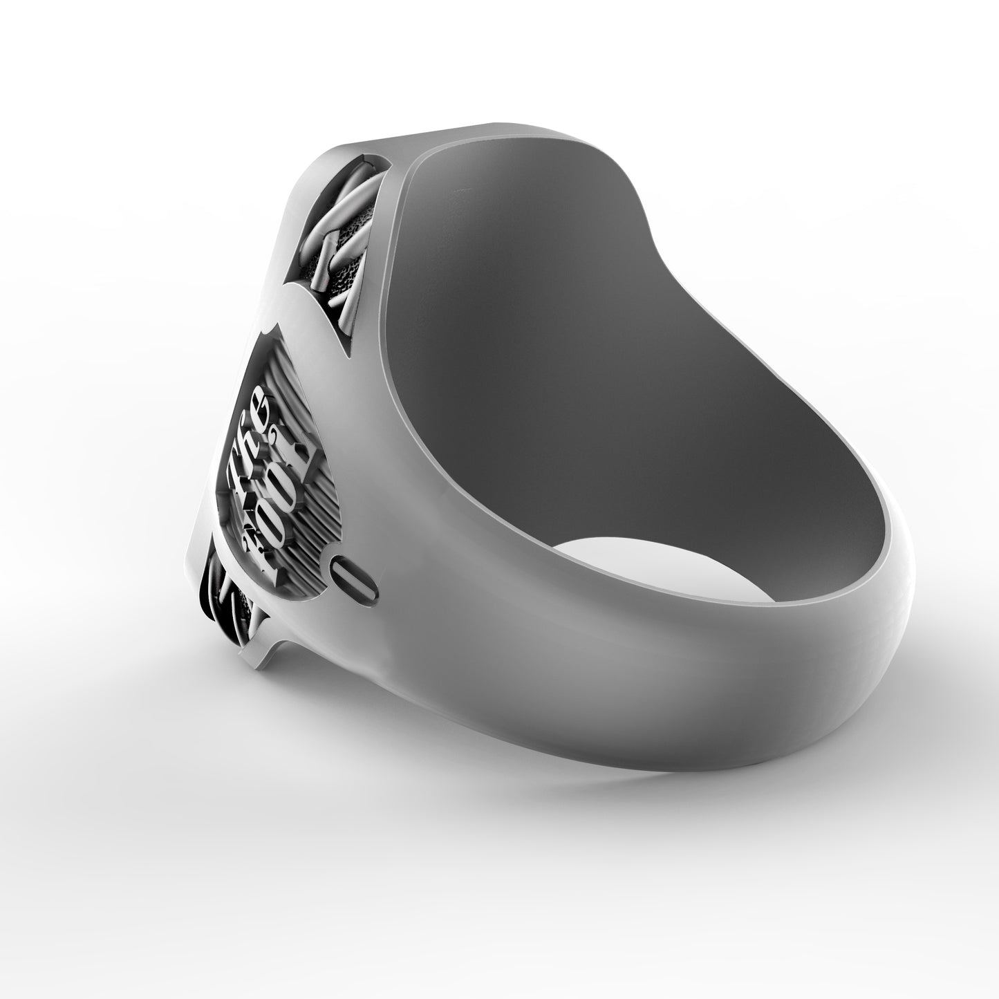 A silver ring with a unique design and text on it.