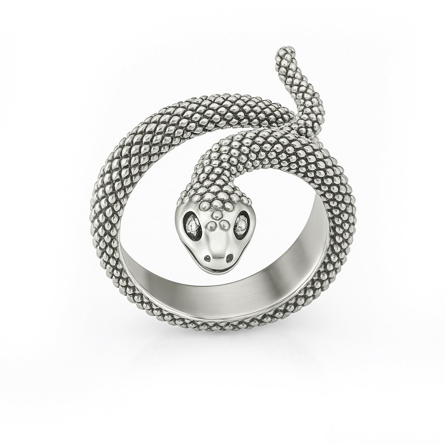 Sterling silver snake ring featuring a detailed scale texture and a coiled wrap-around design.
The serpent’s head is sculpted with precision, adding a bold and symbolic touch.
A unisex piece inspired by mythology and nature. Handmade and rhodium-plated to preserve shine and durability.