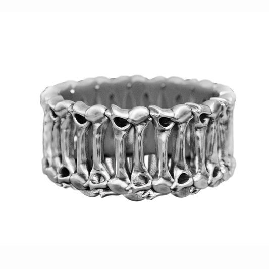 The 'Eternal Bones' ring is a symbol of eternity and the inevitability of time. Its intricate anatomical design embraces the philosophy of Memento Mori, reminding us of life's fragility and the strength of the spirit. A unique sterling silver piece for those who appreciate deep symbolism and bold aesthetics.