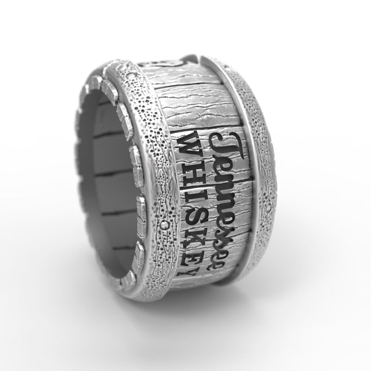 Handcrafted sterling silver whiskey barrel ring for men by Indigo Jewelry. Chunky rustic design with wood texture and rivet details. Inspired by aged bourbon barrels, this silver band ring is a unique gift for him, whiskey lover ring, artisan silver jewelry, masculine statement ring, and personalized handmade men’s accessory with oxidized silver finish.