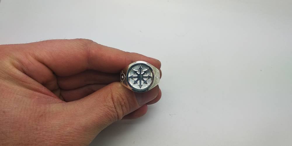 Chunky silver signet ring for men featuring the Chaos Magic Star symbol. Occult jewelry with chaos ring design, alchemy and sigil elements. Perfect for fans of chaos magic, mystical symbolism, and powerful statement rings. Ideal men's ring for ritual, gothic style, or unique spiritual expression.