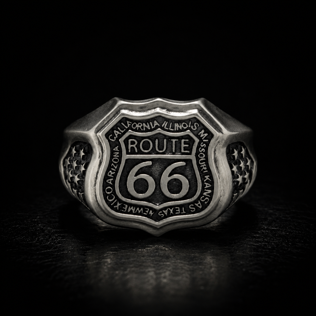 Bikers & Brutalists collection by Indigo Jewelry featuring a handcrafted oxidized sterling silver Route 66 signet ring. Bold symbolic biker jewelry inspired by motorcycle culture, freedom, travel and rugged masculine style.