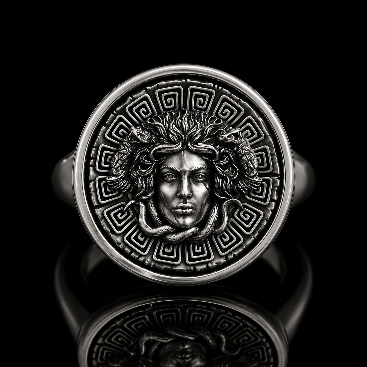 Women Rings collection by Indigo Jewelry featuring a handcrafted oxidized sterling silver Medusa ring inspired by mythology, symbolism and feminine strength. Elegant women’s jewelry crafted with timeless detail and refined character.
