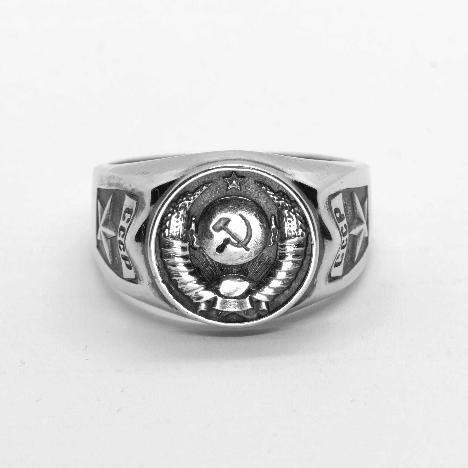 The State Emblem of the USSR, Emblem of the Soviet Union, Sterling Silver Ring. Coat of arms of the Soviet Union" Big sterling silver signet with round top. This design was fixed in the 1924 Soviet Constitution: "The State Emblem of the USSR is composed of a sickle and a hammer on a globe depicted in the rays of the sun and framed by ears of wheat, with the inscription "proletarians of the world, unite!".
