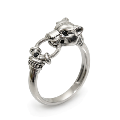 Polished sterling silver panther head ring with black gemstones, animal ring by Indigo Jewelry on white background