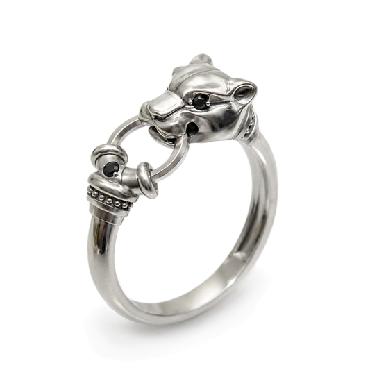 Polished sterling silver panther head ring with black gemstones, animal ring by Indigo Jewelry on white background