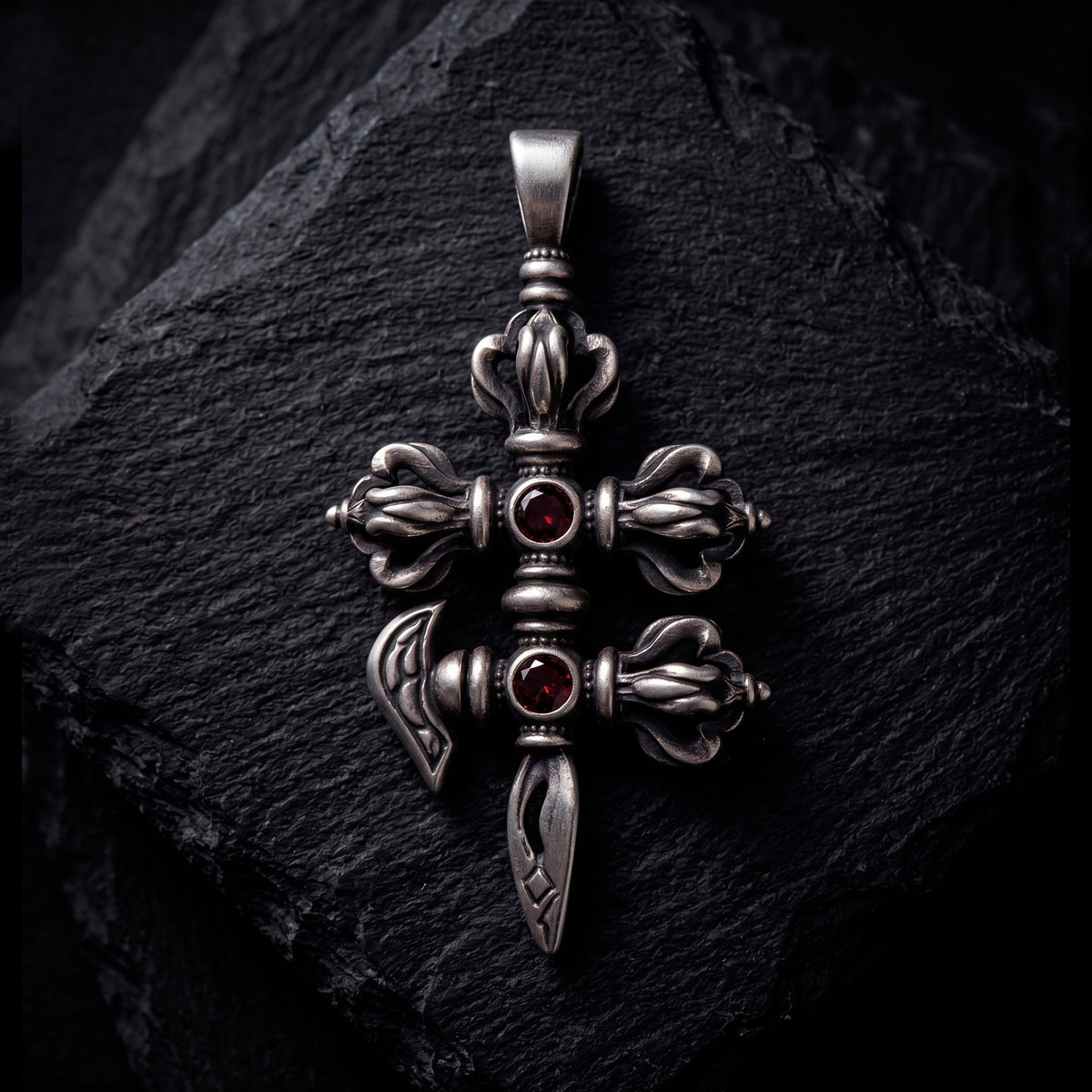 Blackened silver Vajra Phurba pendant with two red garnets by INDIGO Jewelry Atelier