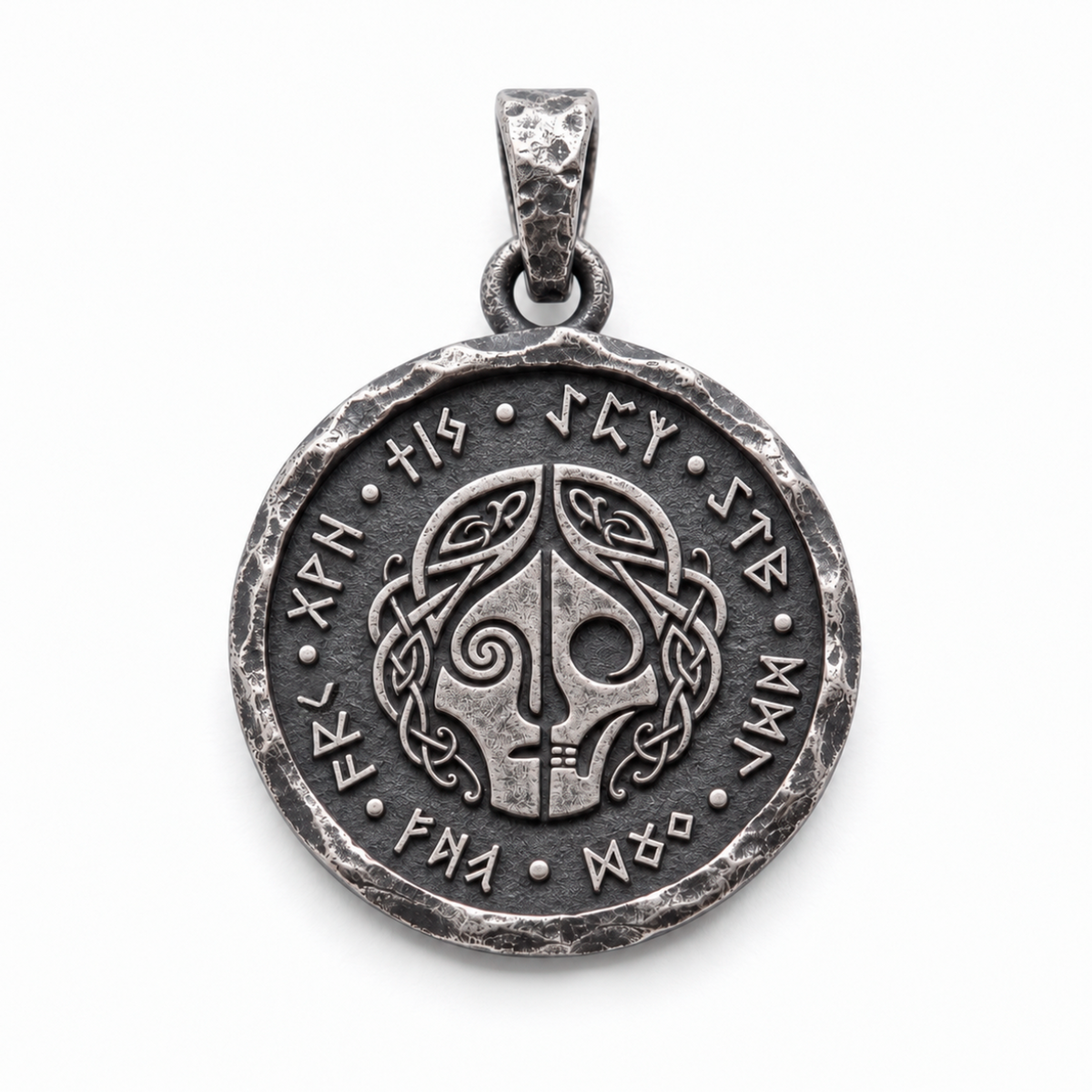 Hel pendant in 925 silver with a divided face, skull detail and runic border on white. INDIGO Jewelry.