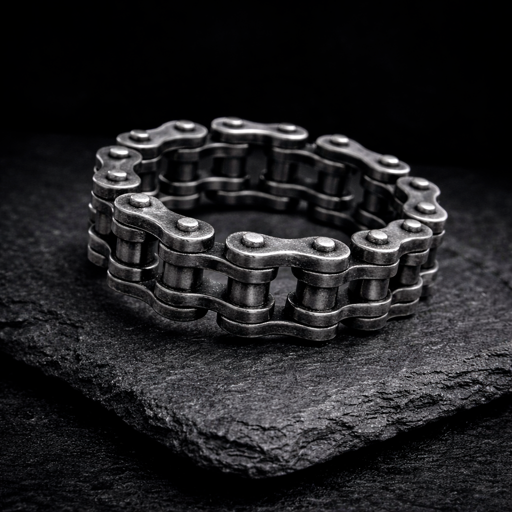 Biker band and motorcycle chain ring by indigo.jewelry, unique statement ring with industrial design and spinner band features, handcrafted for a heavy moto ring look.