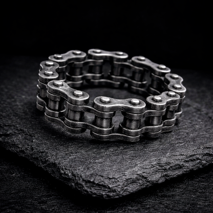 Biker band and motorcycle chain ring by indigo.jewelry, unique statement ring with industrial design and spinner band features, handcrafted for a heavy moto ring look.