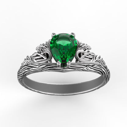 Handmade sterling silver ring with a natural green topaz gemstone. Unique branch and leaf design inspired by nature and forests. Elegant silver jewelry, perfect engagement ring or anniversary gift for her. Rustic woodland ring with a pear-cut gemstone. Symbolic jewelry for nature lovers, travelers, and those who appreciate handmade craftsmanship.