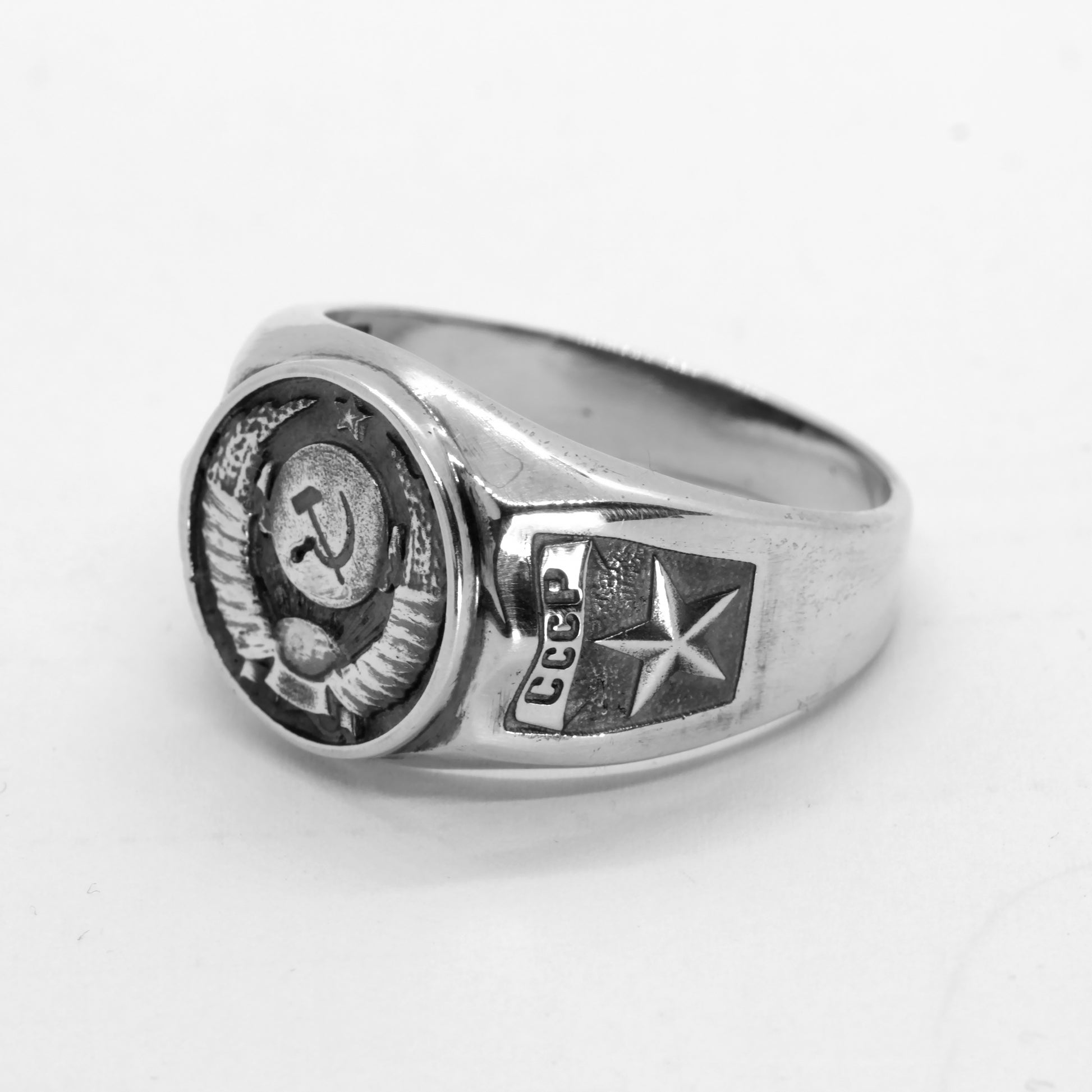 The State Emblem of the USSR, Emblem of the Soviet Union, Sterling Silver Ring. Coat of arms of the Soviet Union" Big sterling silver signet with round top. This design was fixed in the 1924 Soviet Constitution: "The State Emblem of the USSR is composed of a sickle and a hammer on a globe depicted in the rays of the sun and framed by ears of wheat, with the inscription "proletarians of the world, unite!".