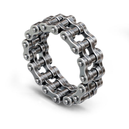 Biker band and motorcycle chain ring by indigo.jewelry, unique statement ring with industrial design and spinner band features, handcrafted for a heavy moto ring look.