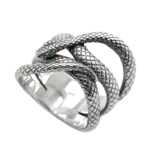  This elegant sterling silver snake ring wraps gracefully around the finger, featuring shimmering white zircon eyes that add a hypnotic, mystical touch. Inspired by the symbolism of transformation, wisdom, and feminine energy, the snake becomes a powerful totem for those who embrace intuition and inner strength. Handcrafted from 925 silver, this ring is a bold yet graceful statement piece — perfect for those who love mysterious, nature-inspired jewelry