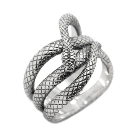  This elegant sterling silver snake ring wraps gracefully around the finger, featuring shimmering white zircon eyes that add a hypnotic, mystical touch. Inspired by the symbolism of transformation, wisdom, and feminine energy, the snake becomes a powerful totem for those who embrace intuition and inner strength. Handcrafted from 925 silver, this ring is a bold yet graceful statement piece — perfect for those who love mysterious, nature-inspired jewelry
