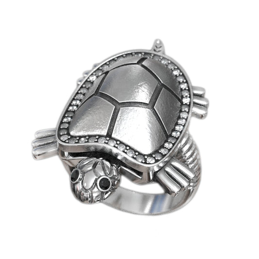This stunning Turtle Ring is a unique piece of jewelry designed for nature lovers and those who admire creative craftsmanship. Made from high-quality 925 sterling silver, it features a beautifully detailed turtle motif symbolizing longevity, wisdom, and protection. Adding to its charm, the turtle’s legs are movable, bringing a playful and dynamic element to the design. The ring is lightweight yet durable, ensuring long-lasting wear and comfort. Perfect for animal enthusiasts, sea life admirers, or anyone lo
