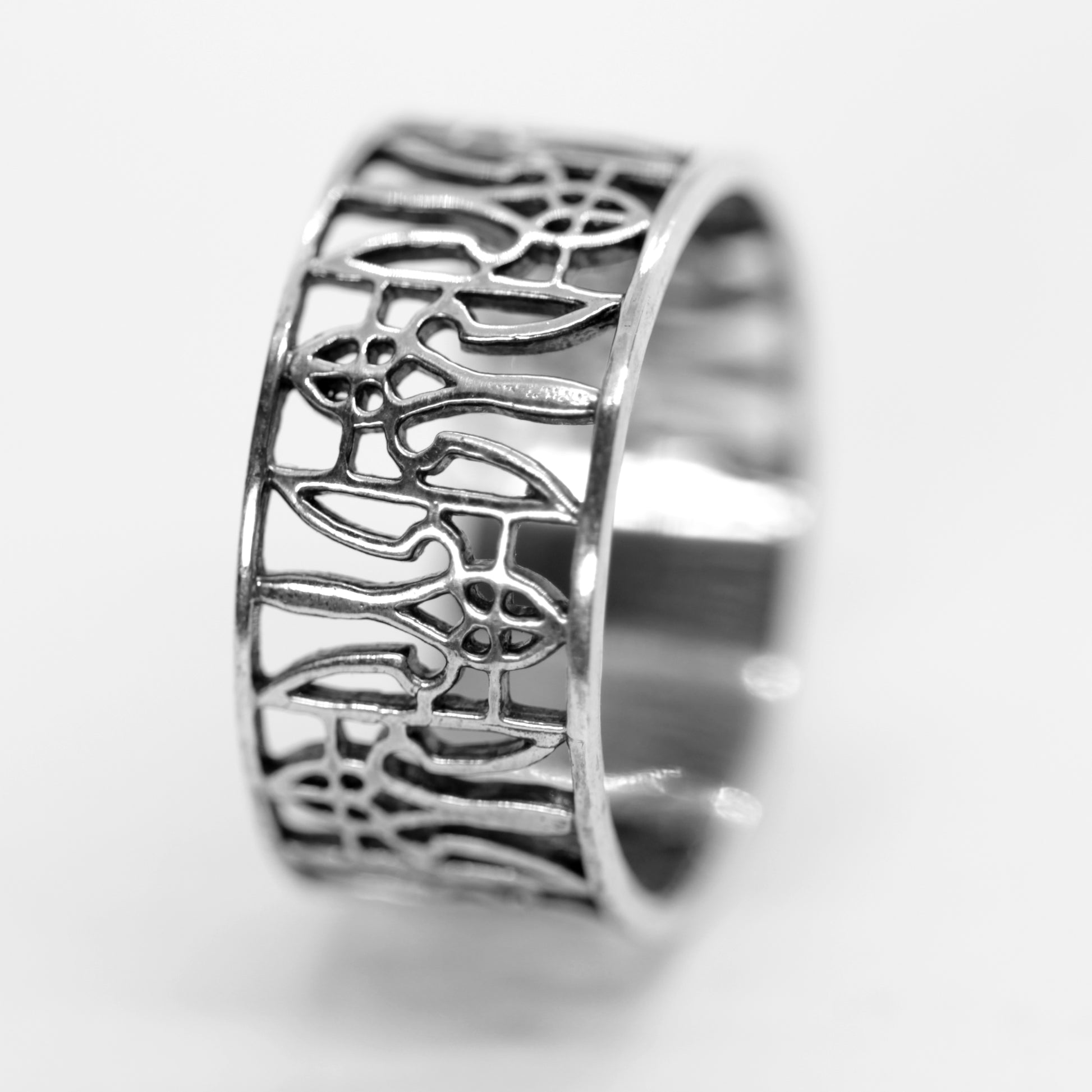 Sterling silver Ukrainian trident ring, also known as Tryzub ring, symbol of freedom and national heritage jewelry. Wide band unisex ring with ornate ethnic filigree design, perfect as a patriotic ring, heritage ring, or gift ring for men and women. Elegant yet powerful symbol ring representing Ukraine. Handcrafted solid 925 silver ring, oxidized finish for contrast. Exclusive design by INDIGO Jewelry, artisan quality jewelry with cultural meaning and timeless style.