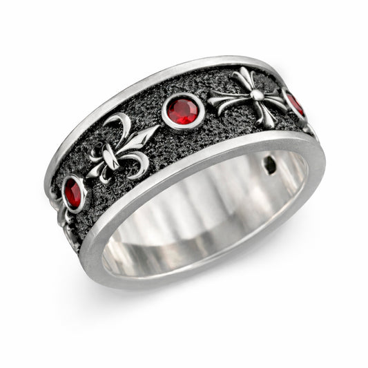 Sterling silver Fleur De Lis ring with deep red garnet stones, featuring an oxidized textured finish and polished heraldic symbols. Medieval gothic band ring inspired by knightly and royal motifs. Solid 925 silver statement ring suitable as a wedding band or symbolic jewelry piece. Elegant, bold, and historically inspired design for men or women, perfect for gothic style, medieval fashion, and unique meaningful gifts.