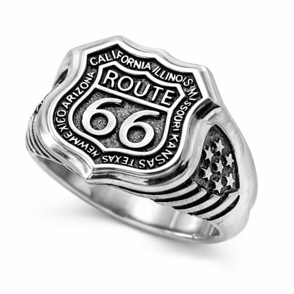 Route 66 sterling silver ring by Indigo Jewelry, men’s biker statement ring crafted from solid 925 silver with oxidized finish. Detailed Route 66 shield engraving with surrounding state names, bold vintage motorcycle jewelry design. Masculine rock style ring inspired by American highway culture, handcrafted silver band for riders, travelers, and lovers of road symbolism.