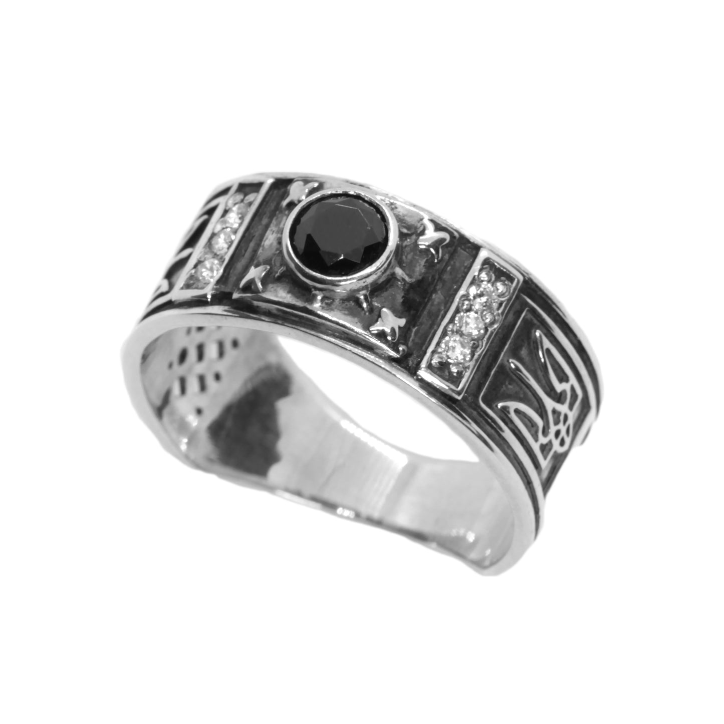 A silver ring with a black gemstone and intricate designs on the band.
