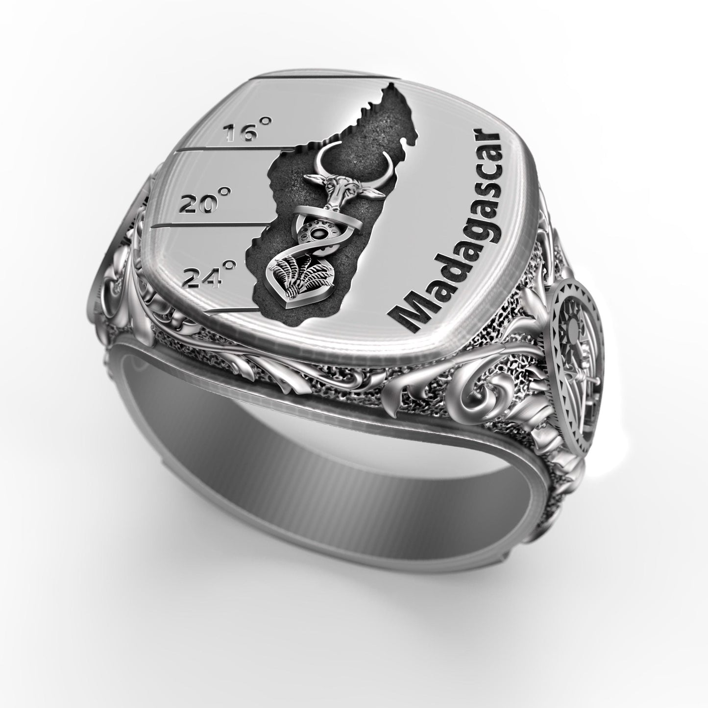 Madagascar silver signet ring with engraved island map, tribal symbols, zebu bull, palm and shield details. Handcrafted men’s jewelry in oxidized sterling silver 925, bold ethnic heritage design, unique symbolic statement ring, heavy masculine accessory, perfect gift for travelers, collectors, or lovers of African culture.