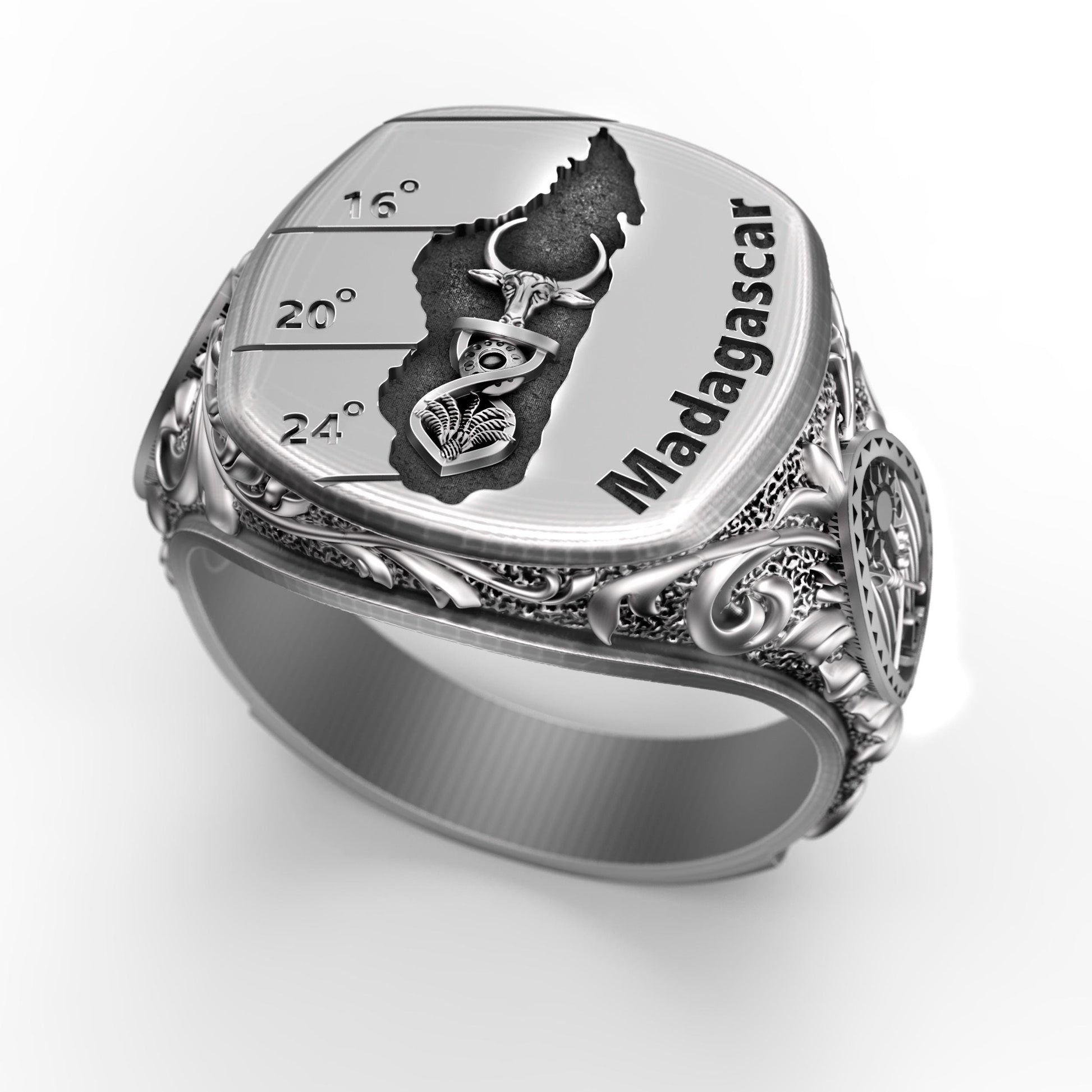 Madagascar silver signet ring with engraved island map, tribal symbols, zebu bull, palm and shield details. Handcrafted men’s jewelry in oxidized sterling silver 925, bold ethnic heritage design, unique symbolic statement ring, heavy masculine accessory, perfect gift for travelers, collectors, or lovers of African culture.