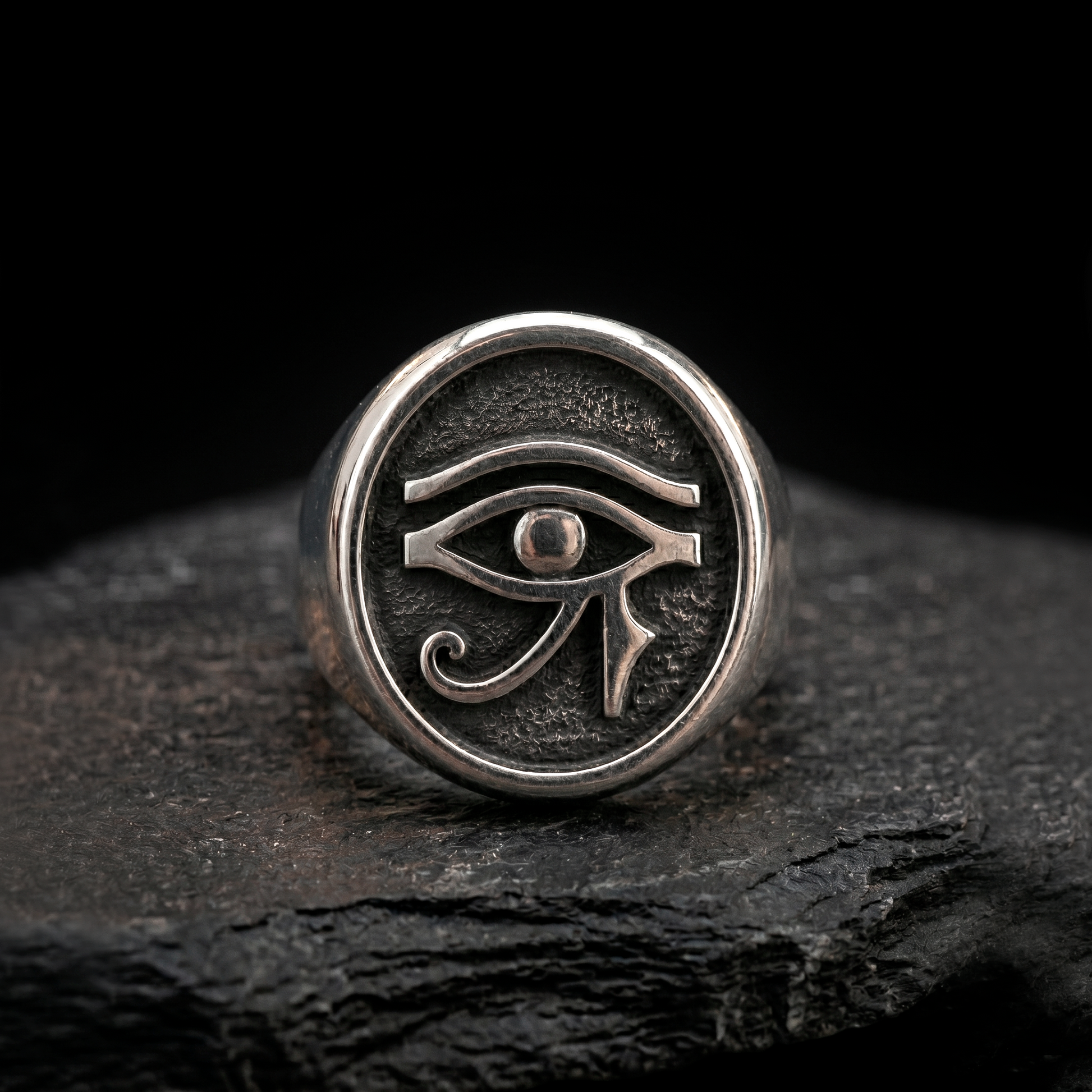 INDIGO Jewelry Atelier eye of horus sterling silver signet ring on dark background, ancient egyptian protection symbol ring