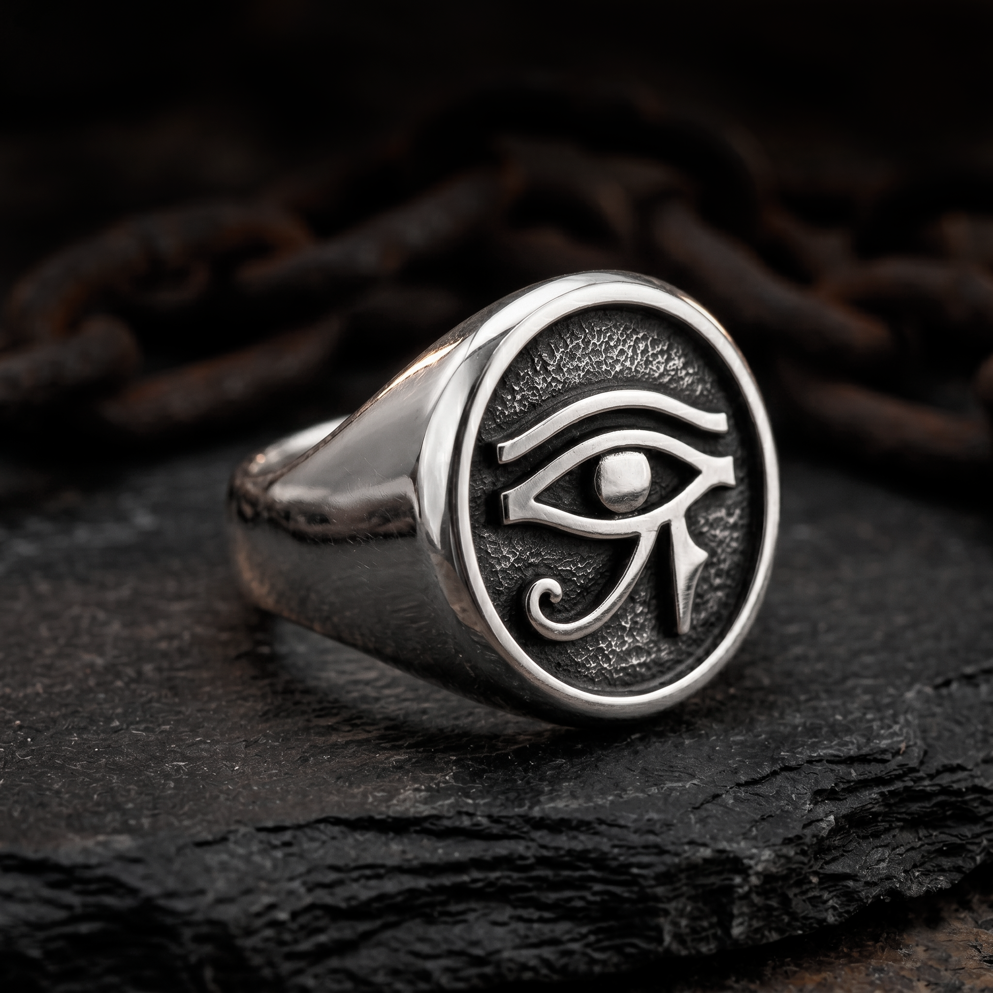 INDIGO Jewelry Atelier close up eye of horus sterling silver signet ring, textured oxidized finish