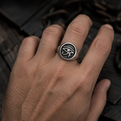 INDIGO Jewelry Atelier eye of horus sterling silver signet ring on male hand, ancient egyptian protection ring