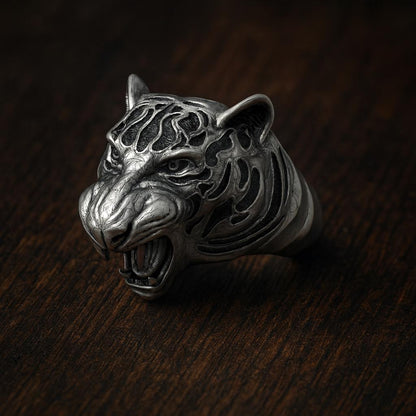 Sterling silver tiger ring with blackened details, handmade gothic biker jewelry for men. This bold 925 silver statement ring features a roaring wild cat head with oxidized textures and polished accents. Perfect as a mens ring, biker ring, or animal ring, it highlights individuality, strength, and fearless style. Crafted from solid silver with a unique oxidized silver patina, durable and stylish for daily wear or special occasions.