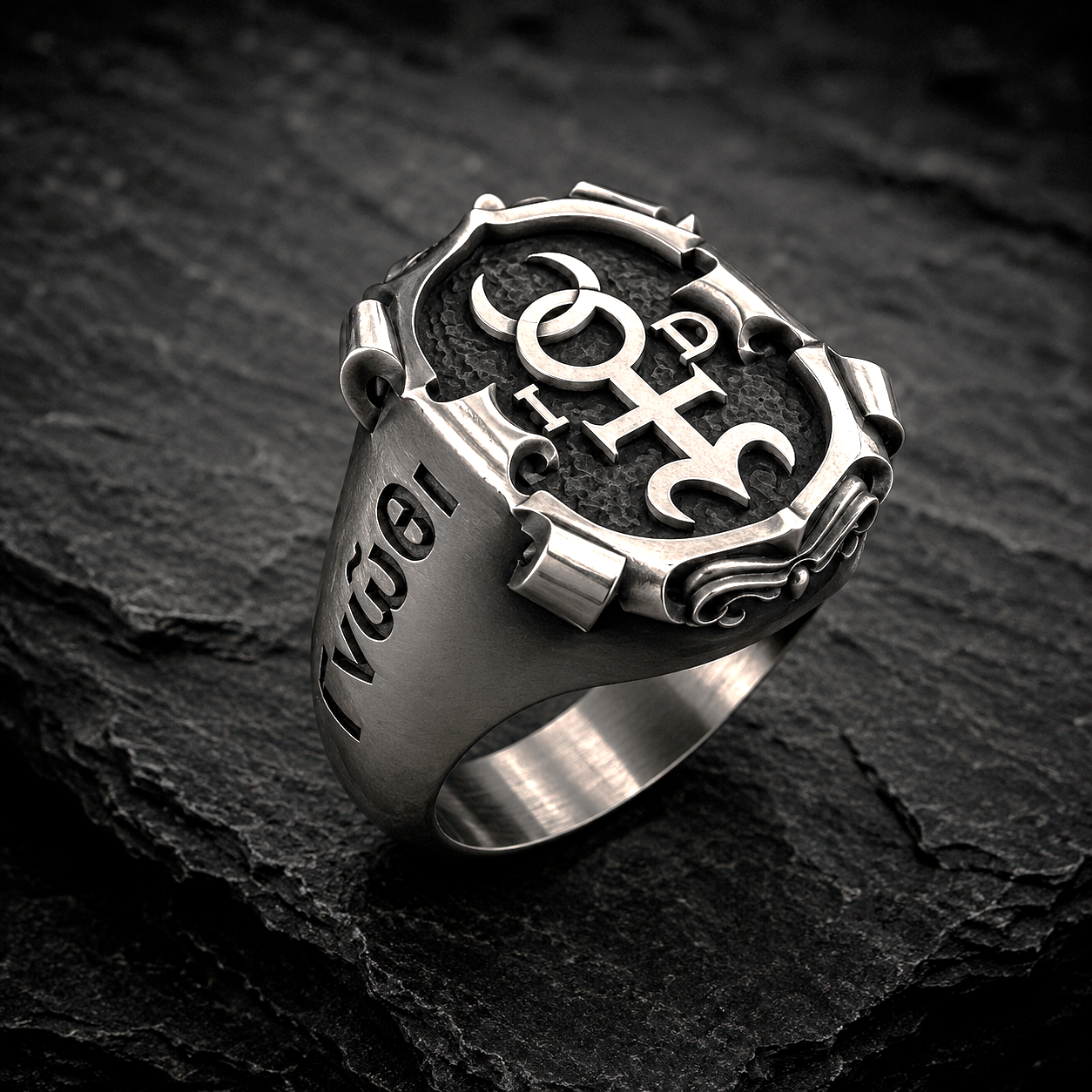 Oxidized silver Monas Hieroglyphica signet ring featuring engraved Greek inscription and polished symbolic details
