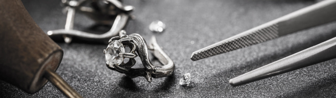 Professional earrings repair service including gemstone replacement, soldering and restoration of broken silver earrings by INDIGO Jewelry