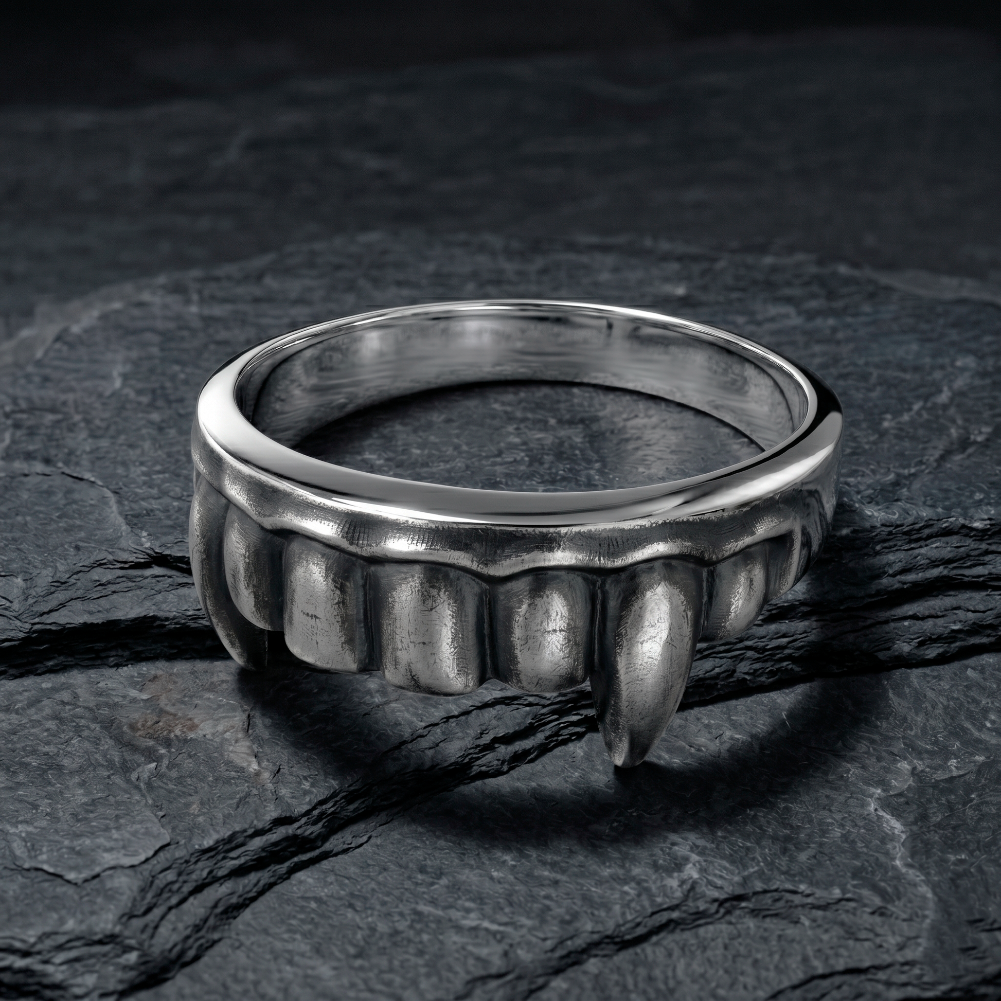 Angled view of sterling silver Vampire Fangs Ring by INDIGO Jewelry Atelier